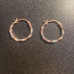 rose gold and zirconium twisted hoop earrings